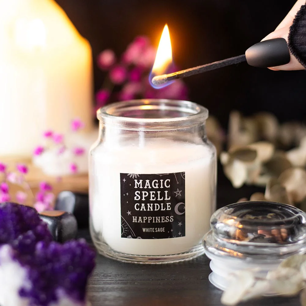 White sage candle in a small white jar with a lid, labeled 'Happiness' spell candle, paraffin wax inside