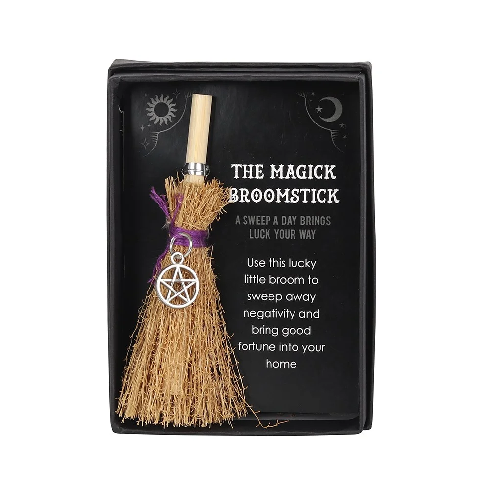 Mini magic broom with silver pentagram charm and inspiring lucky inscription on the handle