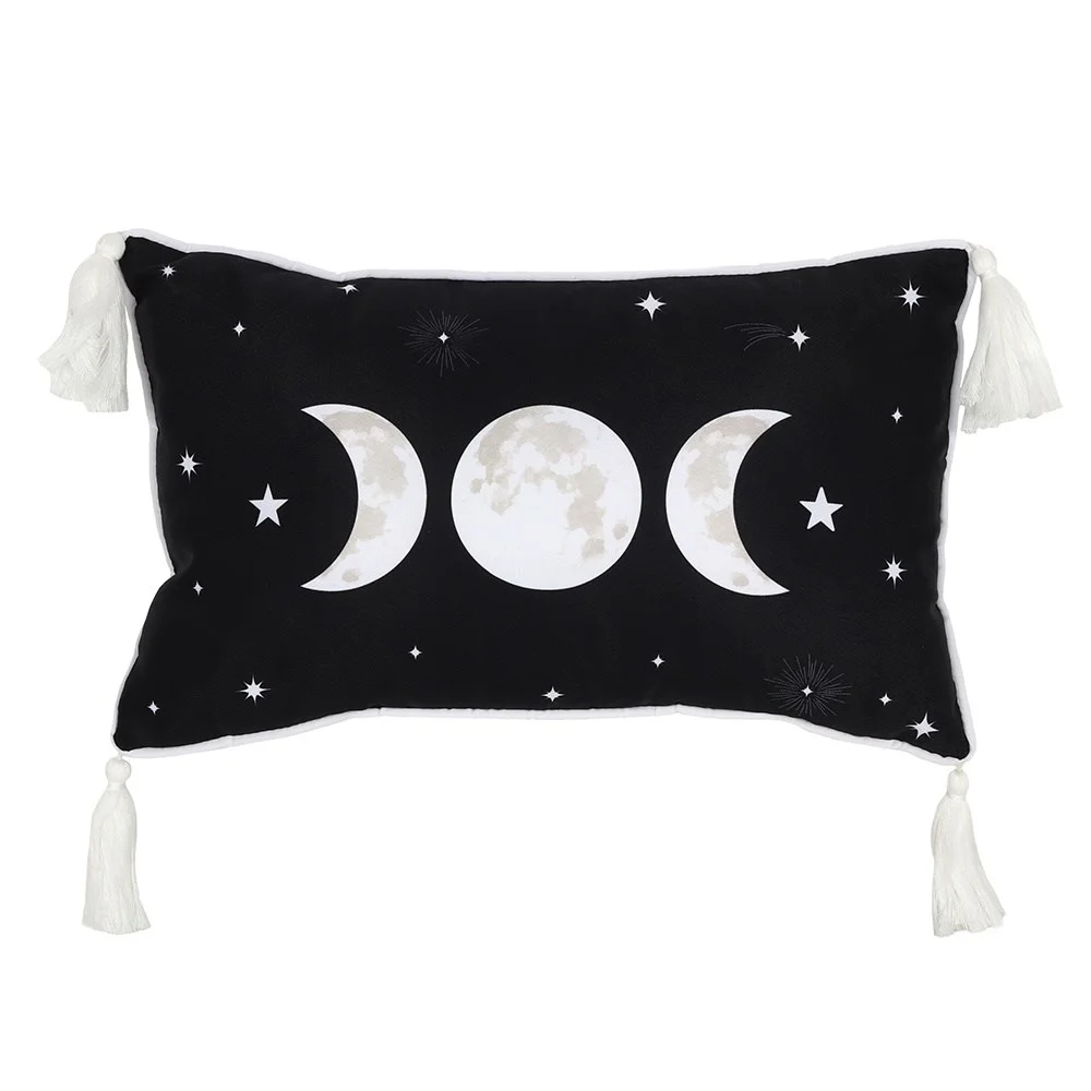 Black rectangular moon cushion with white and grey triple moon design and white tassels on each corner