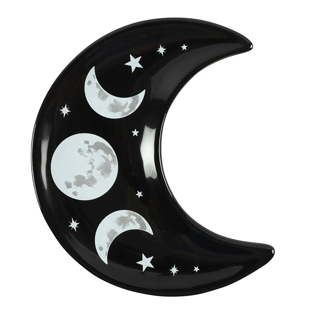 Black crescent moon trinket dish with triple moon design, ideal for storing rings and earrings on a white background