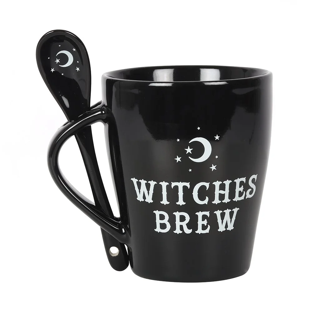 Witches brew mug set with black mug featuring white text and matching spoon with moon and star design in slotted handle