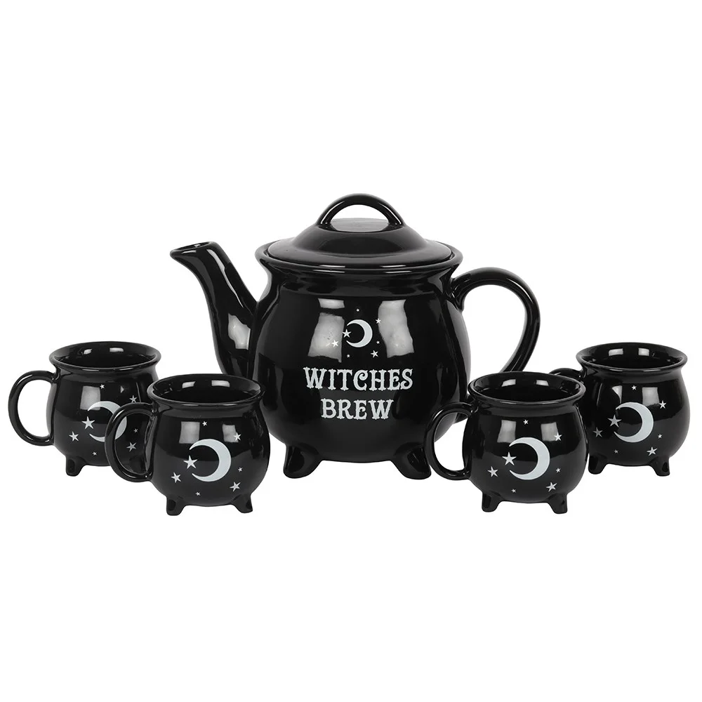 Witches brew tea set with ceramic teapot and four cauldron-shaped cups on a white background