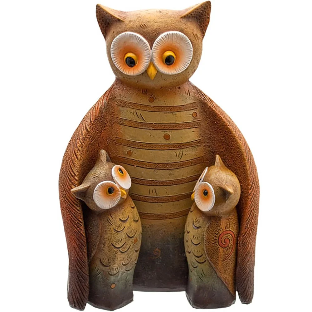 Owl family ornament showing three small owls fitting together as a solid decorative piece, ethically sourced