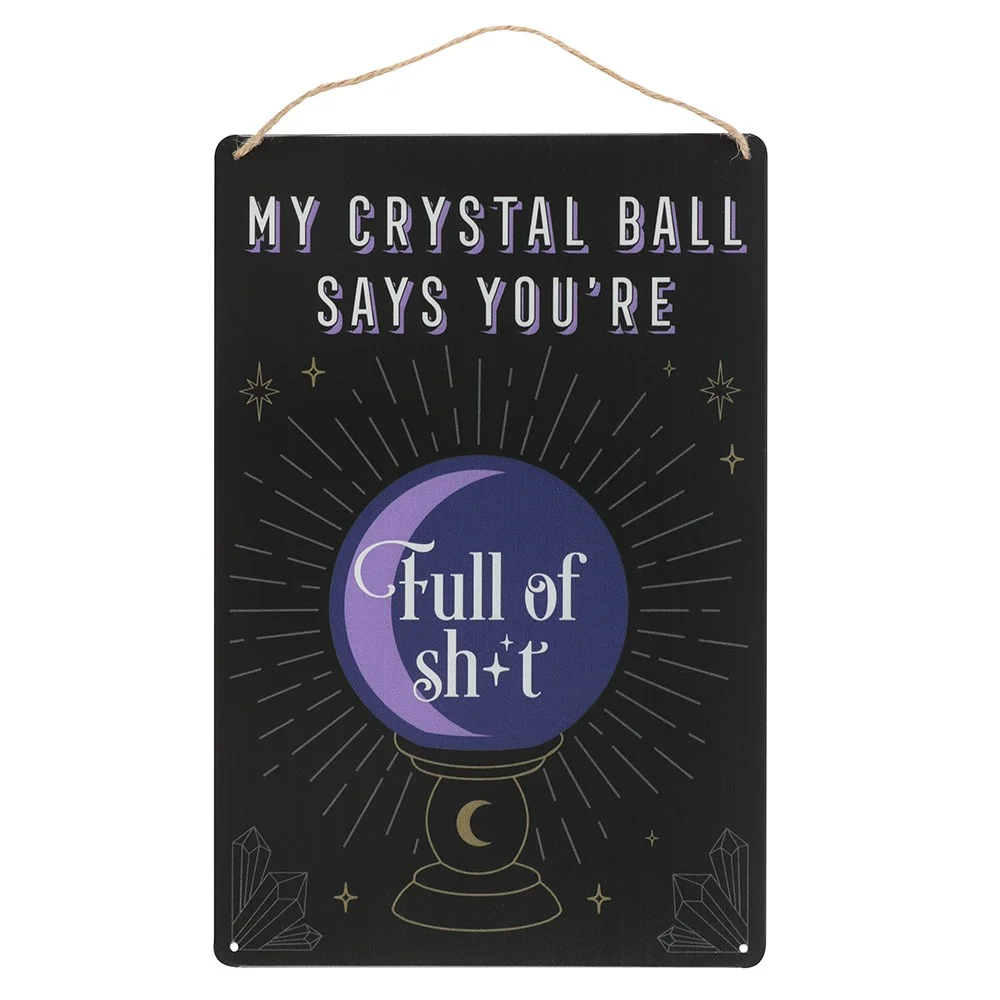 Funny metal wall sign with crystal ball graphic and sassy text "My Crystal Ball Says You're Full of Sh*t" hanging by twine