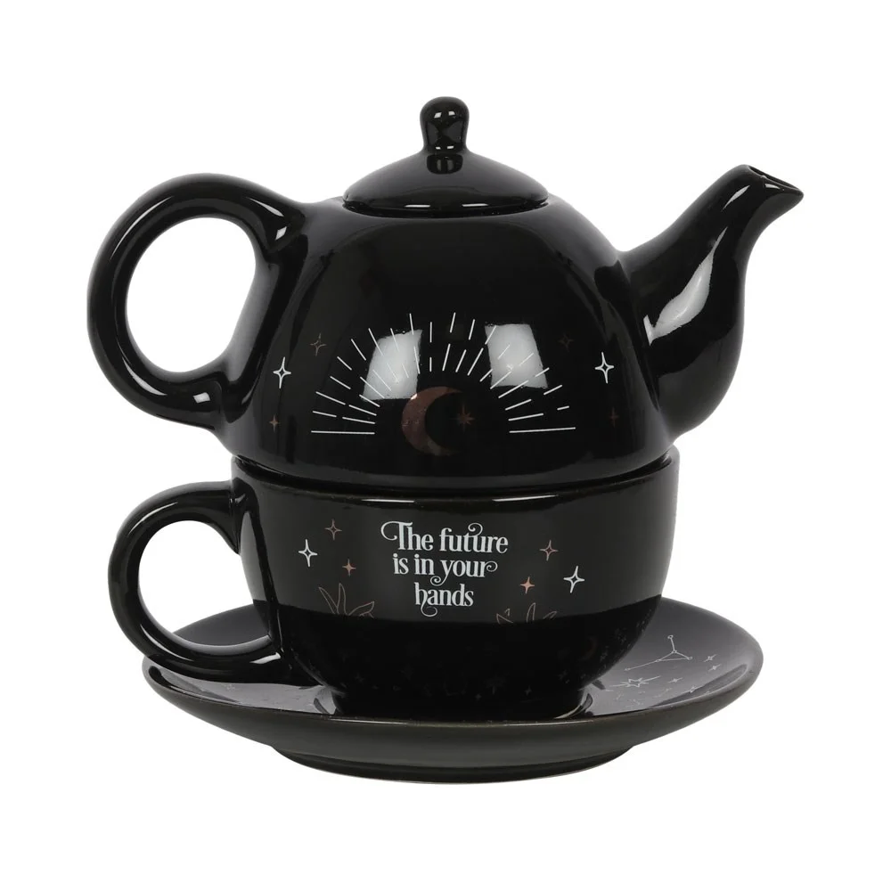 White and gold fortune teller tea set with teapot, mug, and saucer featuring "The future is in your hands" text