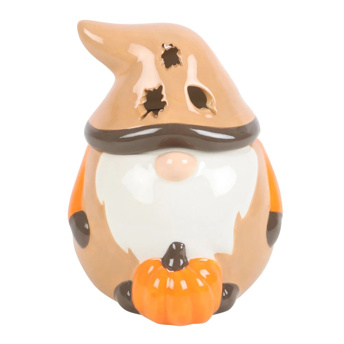 Autumn oil burner shaped like a gonk with orange and brown tones and leaf cut-outs on the hat, glowing warmly
