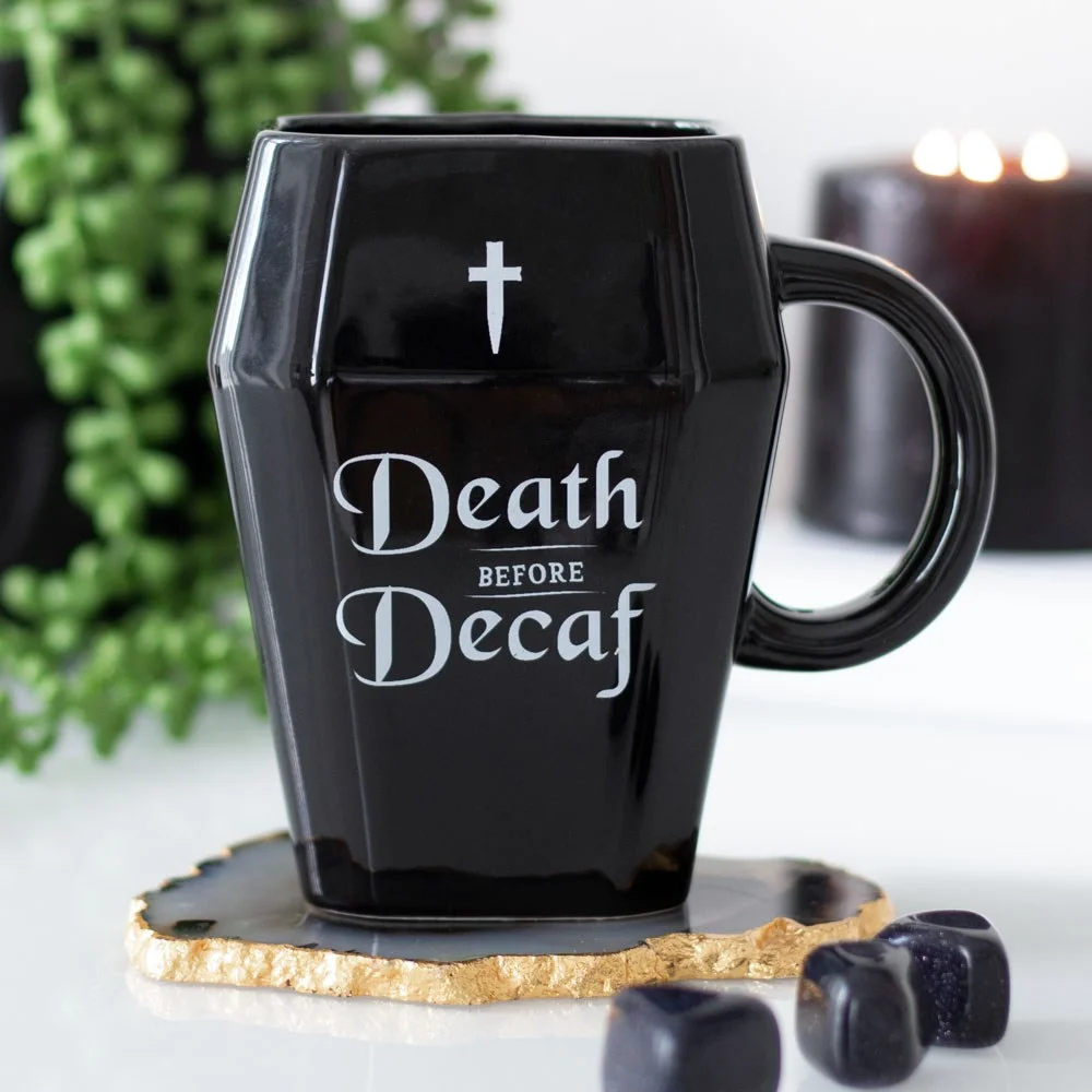 Black coffin mug with "Death Before Decaf" text, 310ml capacity, shown on white background
