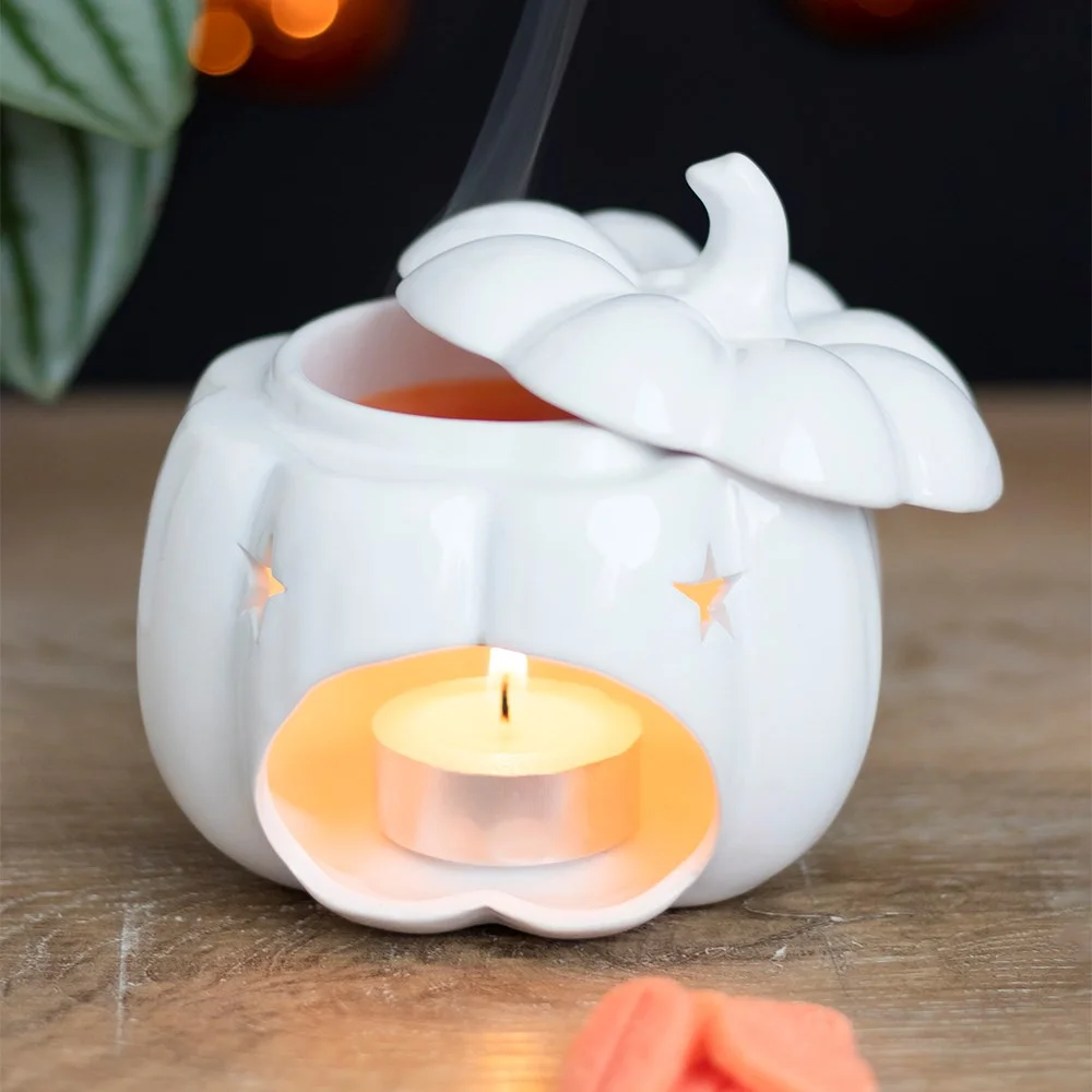 White pumpkin oil burner with a removable lid, designed for tealight and autumnal fragrance oils, 10.5cm cube shape