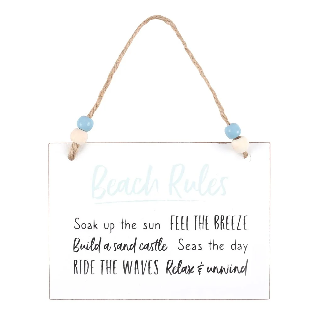 White wooden beach rules sign with text, twine hanger, and wooden beads, measuring about 10cm by 14cm