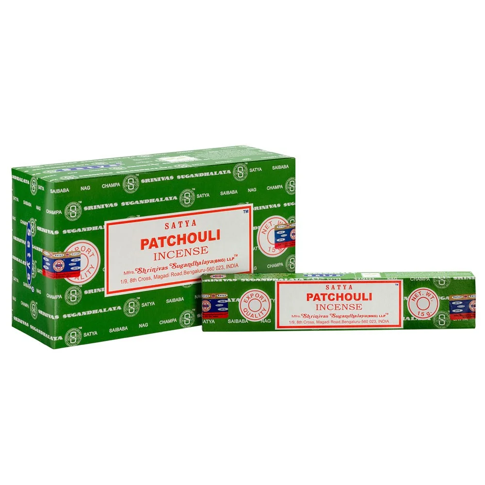 Box containing 12 packs of Satya patchouli incense sticks with green and yellow packaging, each pack holds 10-12 sticks