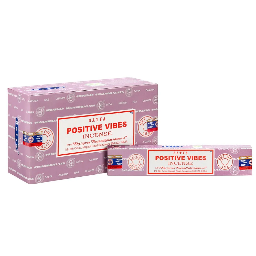 Box containing 12 packs of Satya positive vibes incense sticks with colorful packaging and floral design