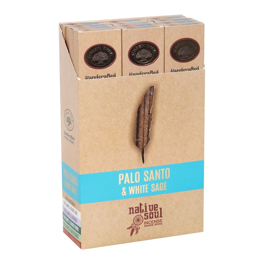 Palo Santo incense sticks in 12 small boxes, each box containing 8 sticks, arranged on a wooden surface.
