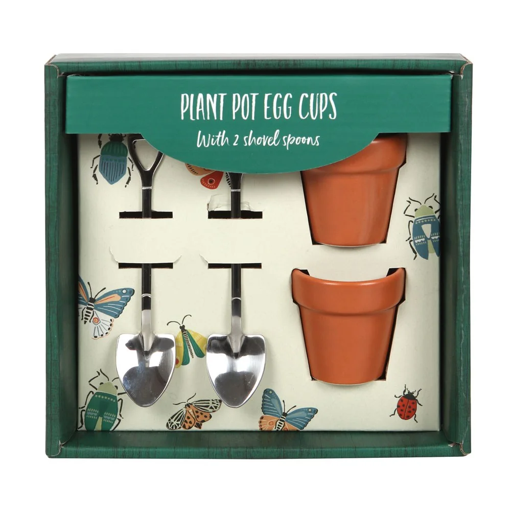 Novelty egg cup set featuring plant pot designs and matching shovel spoons, perfect for kitchen and gardening.