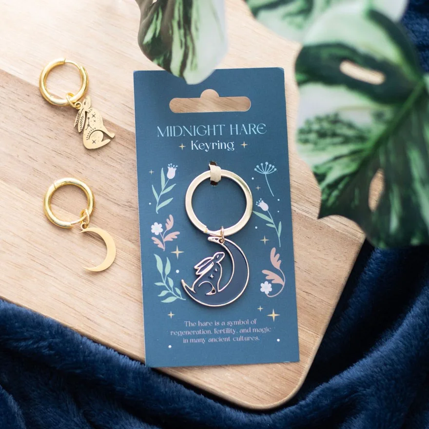 Elegant metal moon hare keyring featuring a detailed hare gazing at the moon, attached to a silver keyring loop