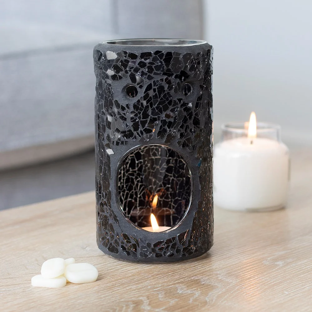 Black glass oil burner with pillar shape and mirrored crackle effect, measuring 14.5cm tall by 8cm wide
