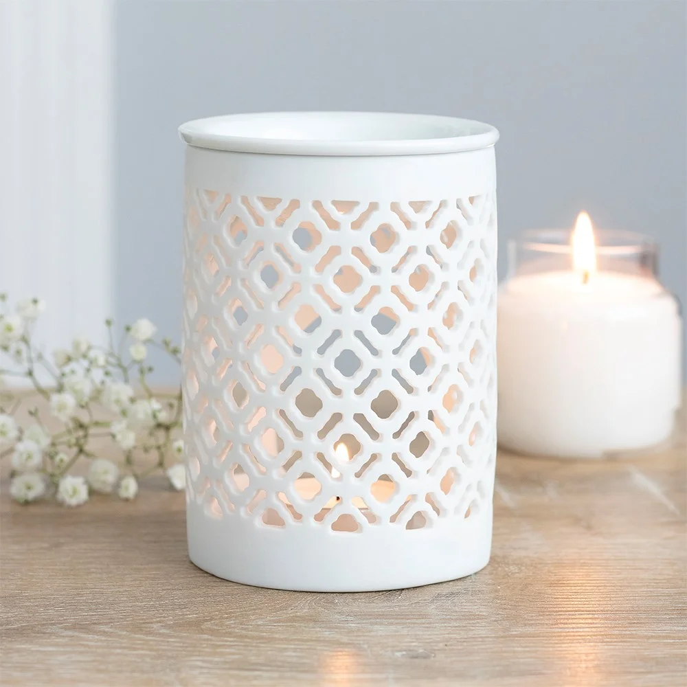 Matte lattice oil burner with elegant cut design, 11cm tall, in neutral tones for versatile home decor use
