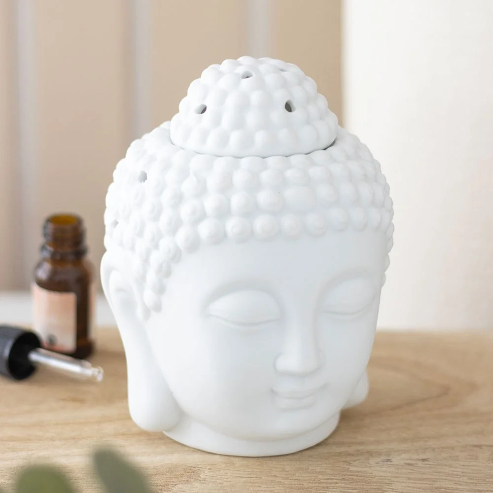 Matte white Buddha head oil burner with a bowl on top, measuring 13cm high, suitable for wax melts or oils