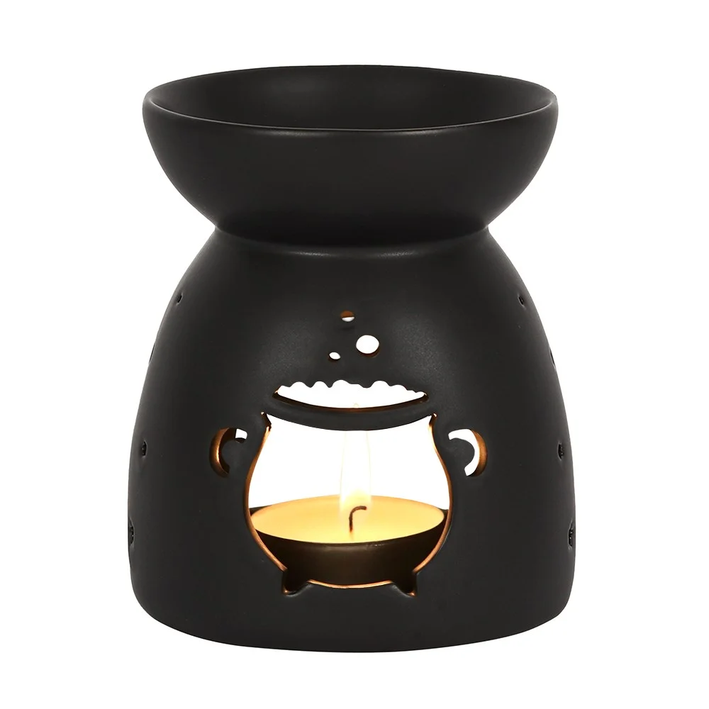 Black ceramic cauldron oil burner with cutout design and matt finish, suitable for fragrance oil and wax