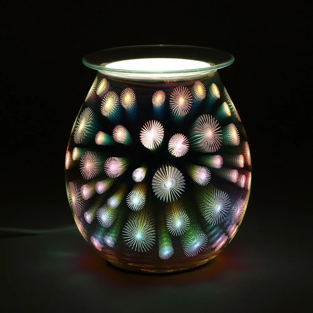 Electric oil burner with colorful 3D starburst light design, glass dish on top, compact and modern style.