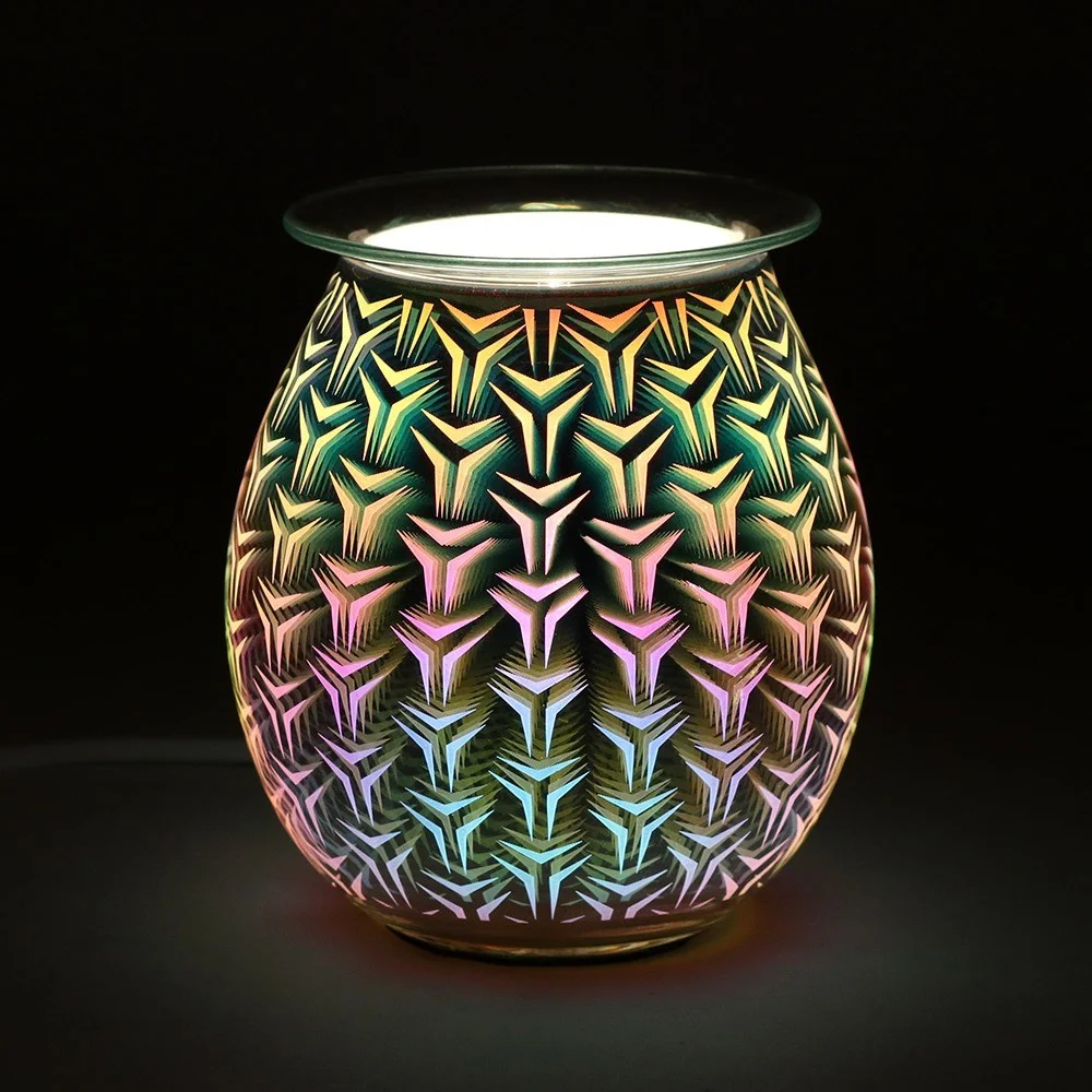 Colourful 3D geometric electric oil burner lit up, compact design on a white background, 14cm tall, 10cm wide