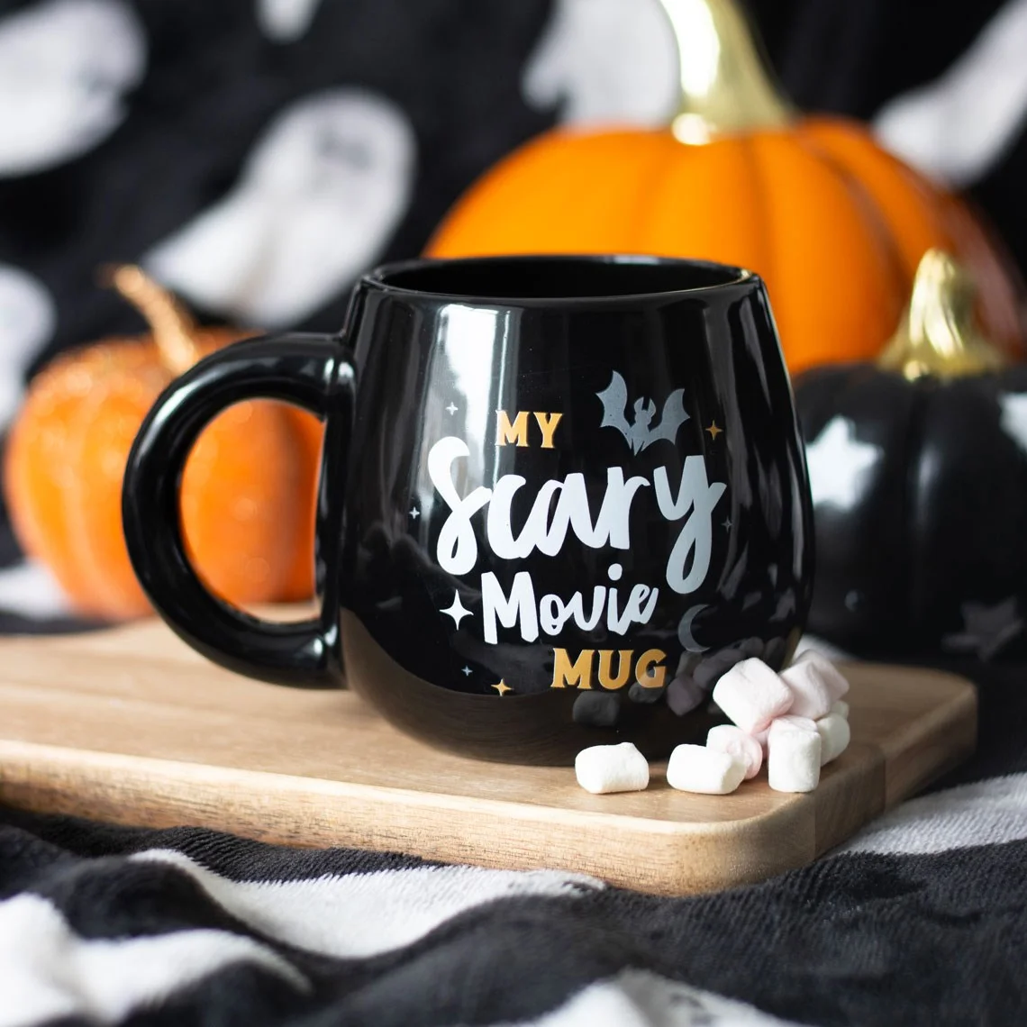 Rounded Halloween mug with flying bat, crescent moon illustration, and "My Scary Movie Mug" text, 490ml capacity