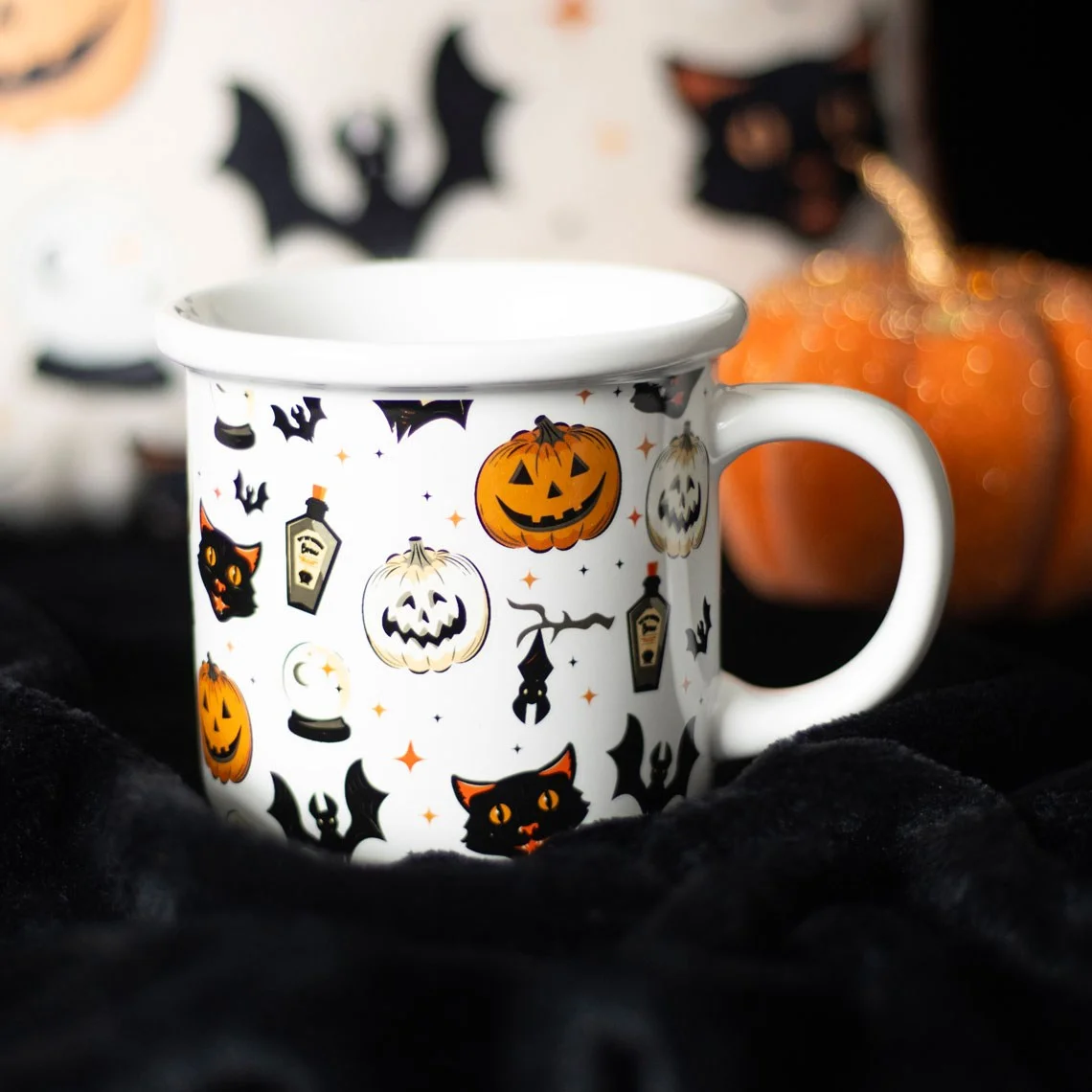Chunky Halloween ceramic mug with black cats, bats, potion bottles, and jack-o'-lanterns, 480ml capacity