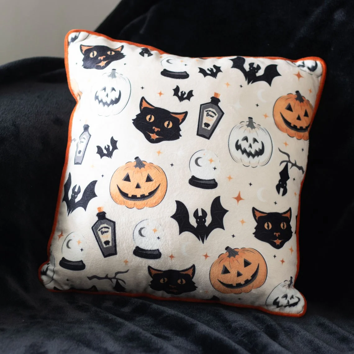 35cm square Halloween cushion with vintage black cat, jack-o'-lantern, and bat print on orange background