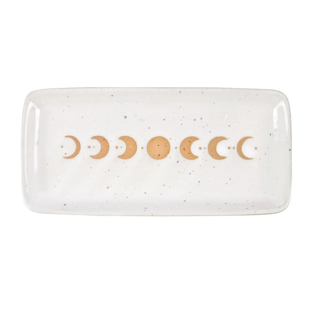 17cm ceramic moon phase trinket tray with stoneware finish and wax resist detailing on white background
