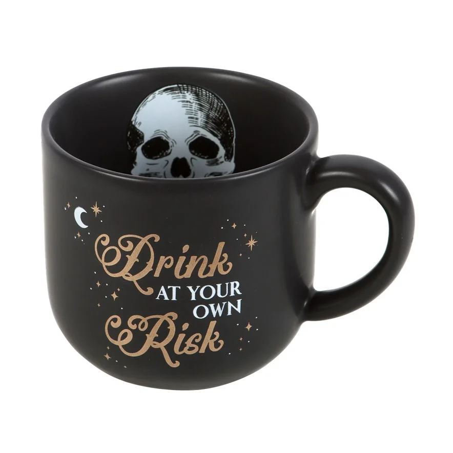Oversized teacup-shaped novelty mug with "Drink At Your Own Risk" text in black on white ceramic, 360ml capacity