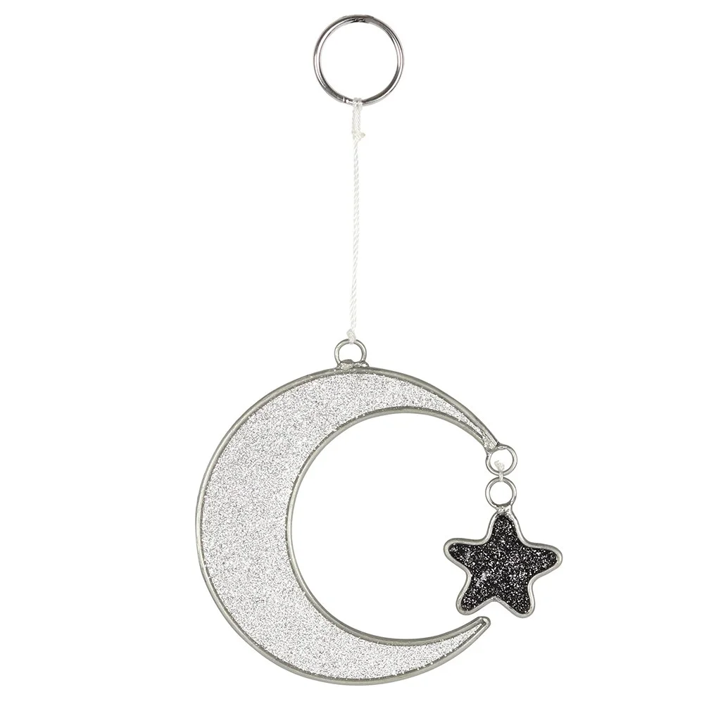 Mystical crescent moon suncatcher with star design, hanging and sparkling in sunlight, 7.5cm tall and 6.5cm wide