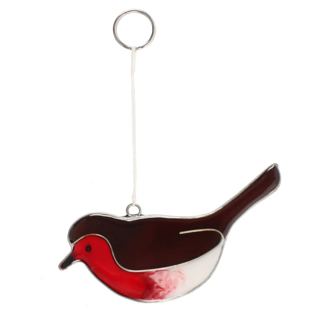 Minimal robin bird suncatcher hanging on a window, reflecting light into a room