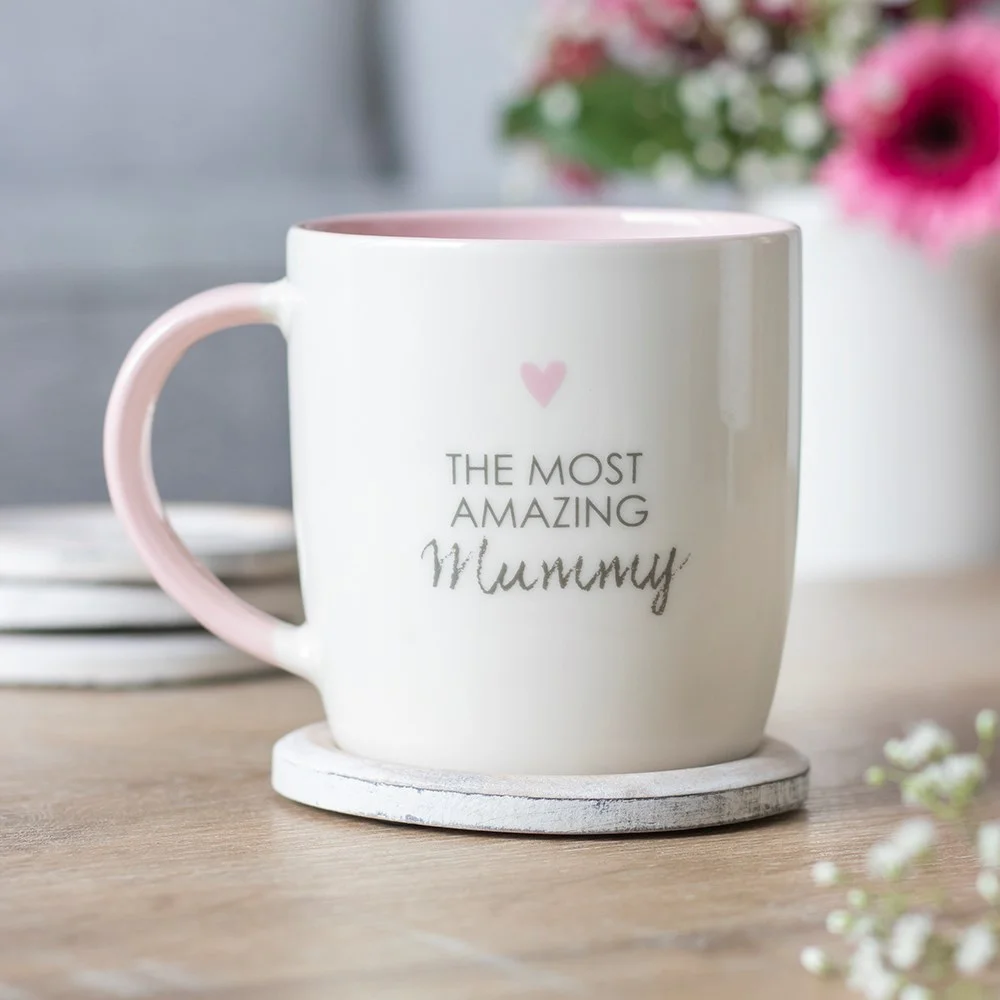 amazing mummy mug, ceramic, text 'The most amazing mummy', tiny pink heart, 500ml capacity, dishwasher and microwave safe.