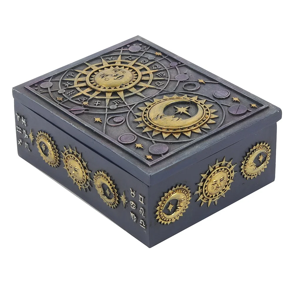 Rectangular resin storage box with raised sun and moon astrology symbols and gold finish on lid