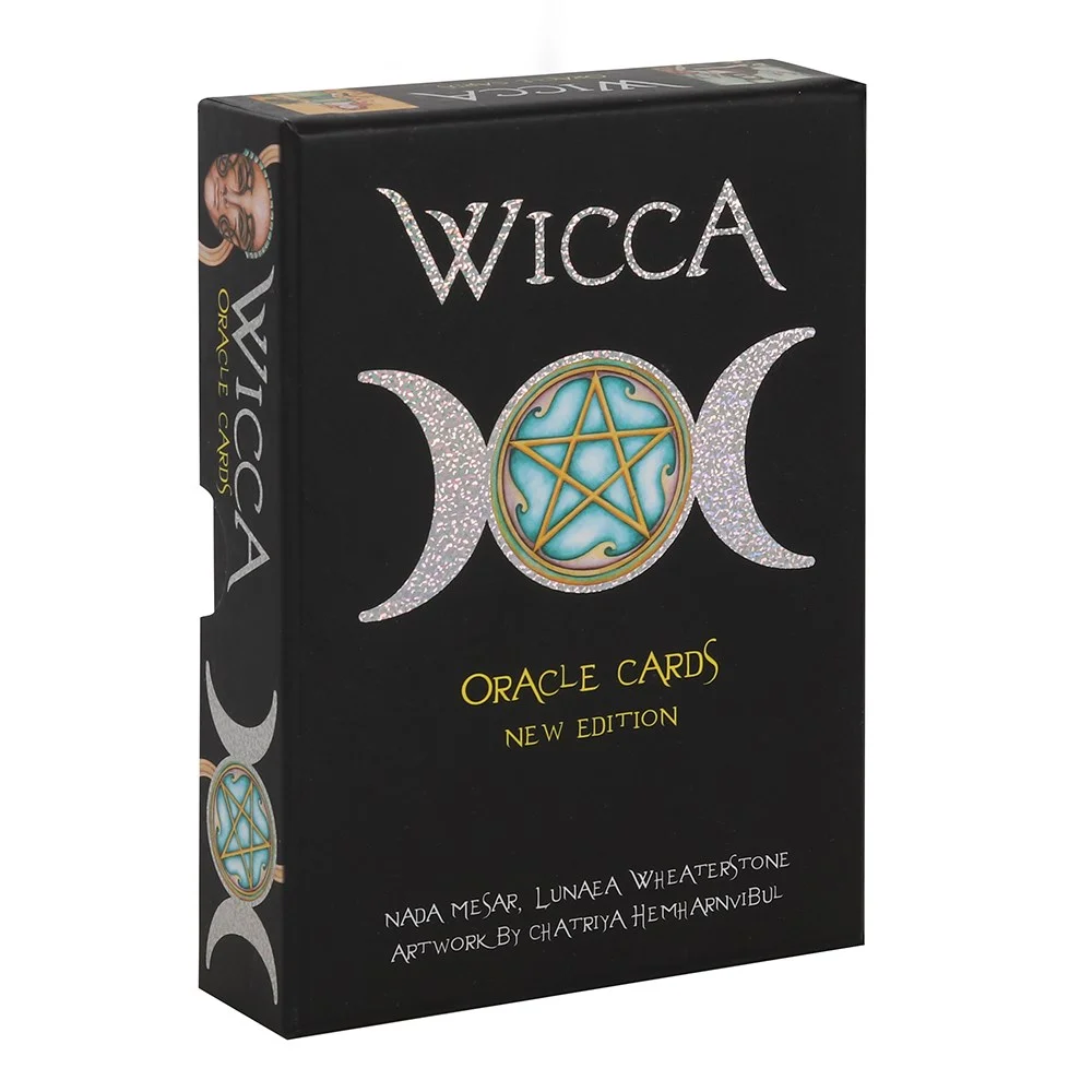 Deck of 33 Wiccan oracle cards presented in a striking cardboard box with a detailed guidebook, featuring artwork by Chatriya Hemharnvibul.