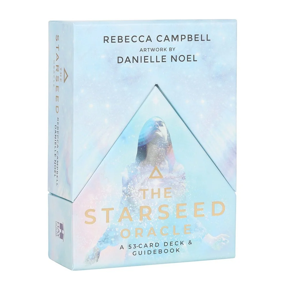 Starseed oracle cards deck and guidebook featuring cosmic artwork by Danielle Noel and Rebecca Campbell's design