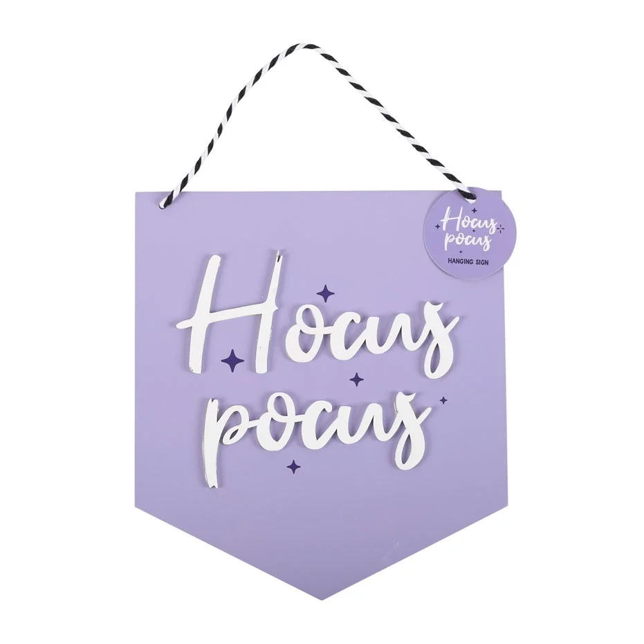 Pastel purple hocus pocus hanging sign with black lettering and decorative string for Halloween decor