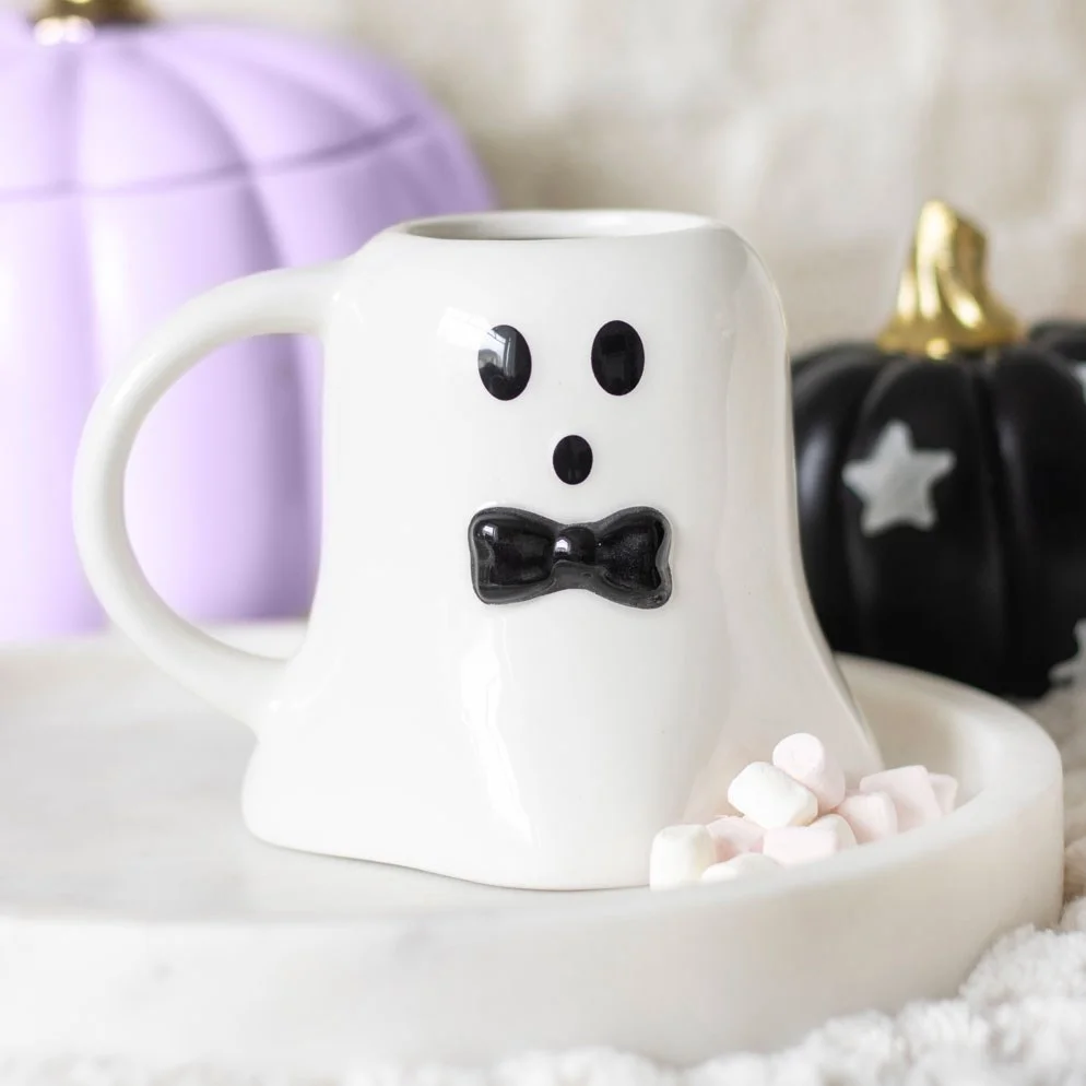 White ghost shaped mug with black bow tie, holding 440ml, perfect for Halloween and autumn drinks