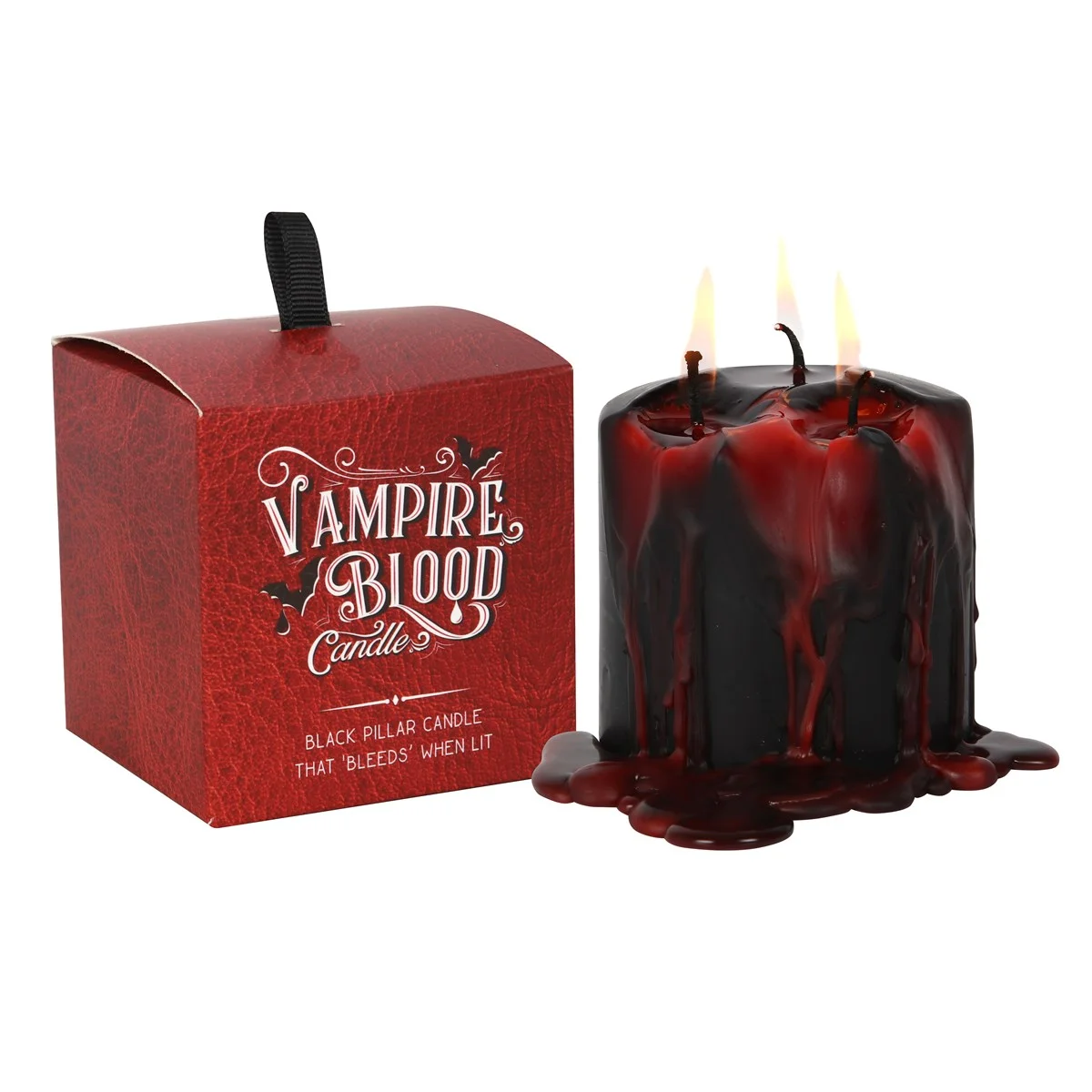 Small red vampire blood candle with bleeding wax effect on a plain white background, 7.6cm tall pillar shape