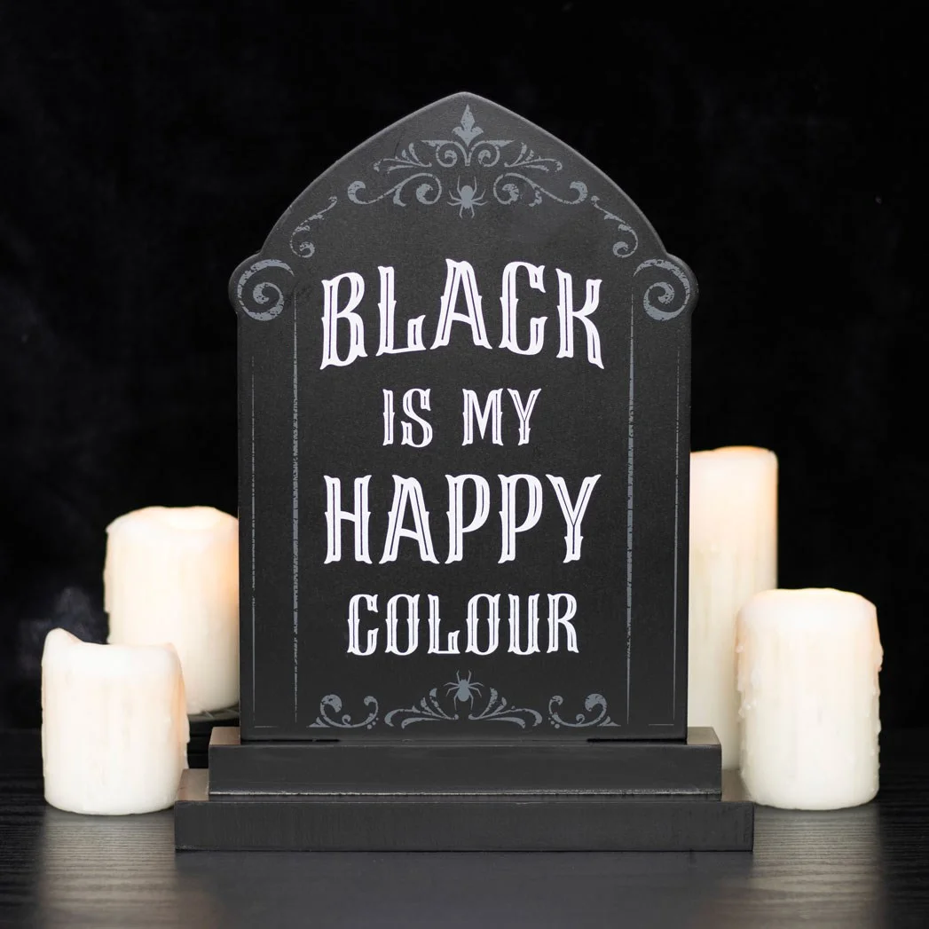 Black is My Happy Colour gothic style sign shaped like a tombstone with white text on black background