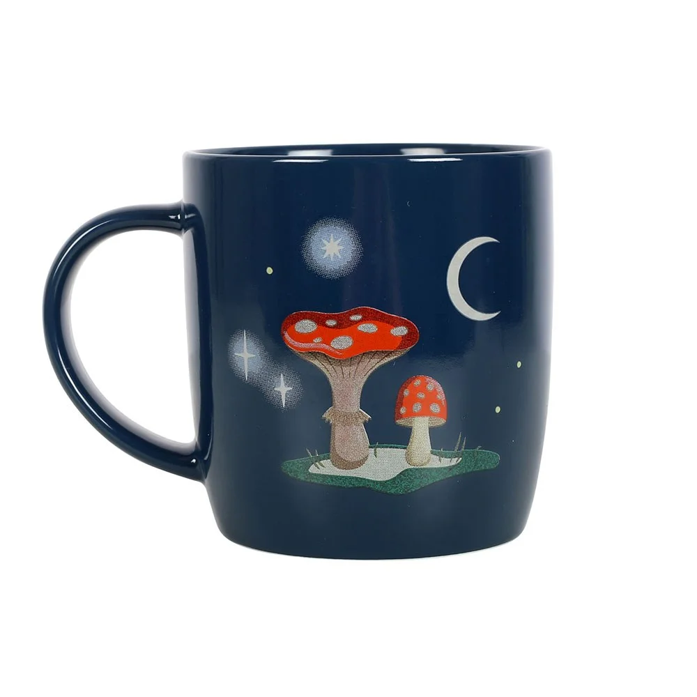 Navy blue winter mushroom mug with mushroom house, snail, crescent moon, and stars illustration, 350ml capacity