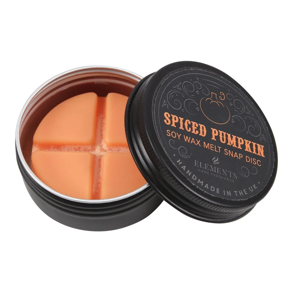 Spiced pumpkin wax melt snap disc in black tin with four divided sections, autumn-themed fragrance packaging