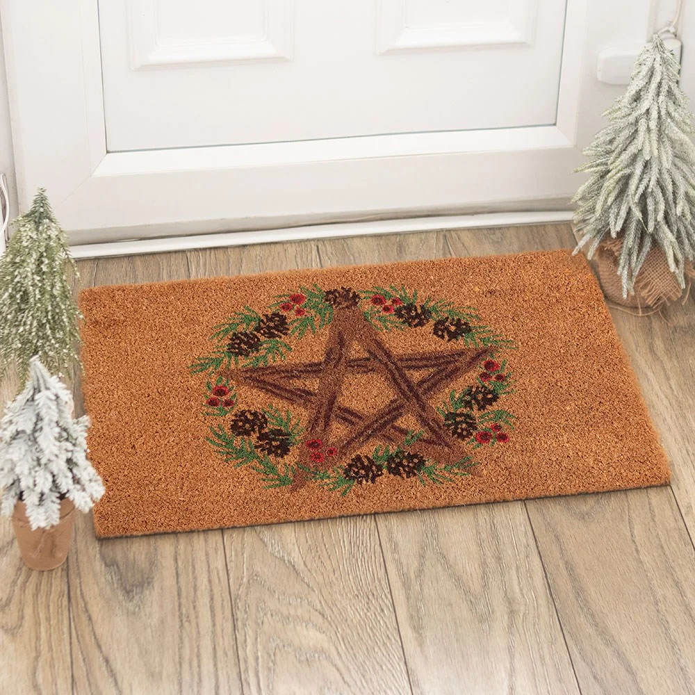 Natural coir winter solstice doormat with rustic pentagram design for seasonal home decoration