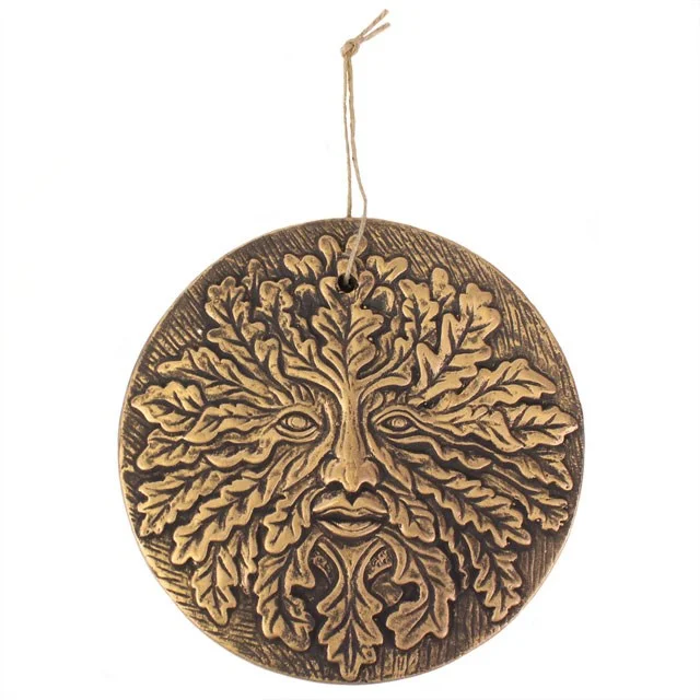 Circular bronze terracotta Green Man plaque with copper effect finish and twine loop for hanging by Lisa Parker