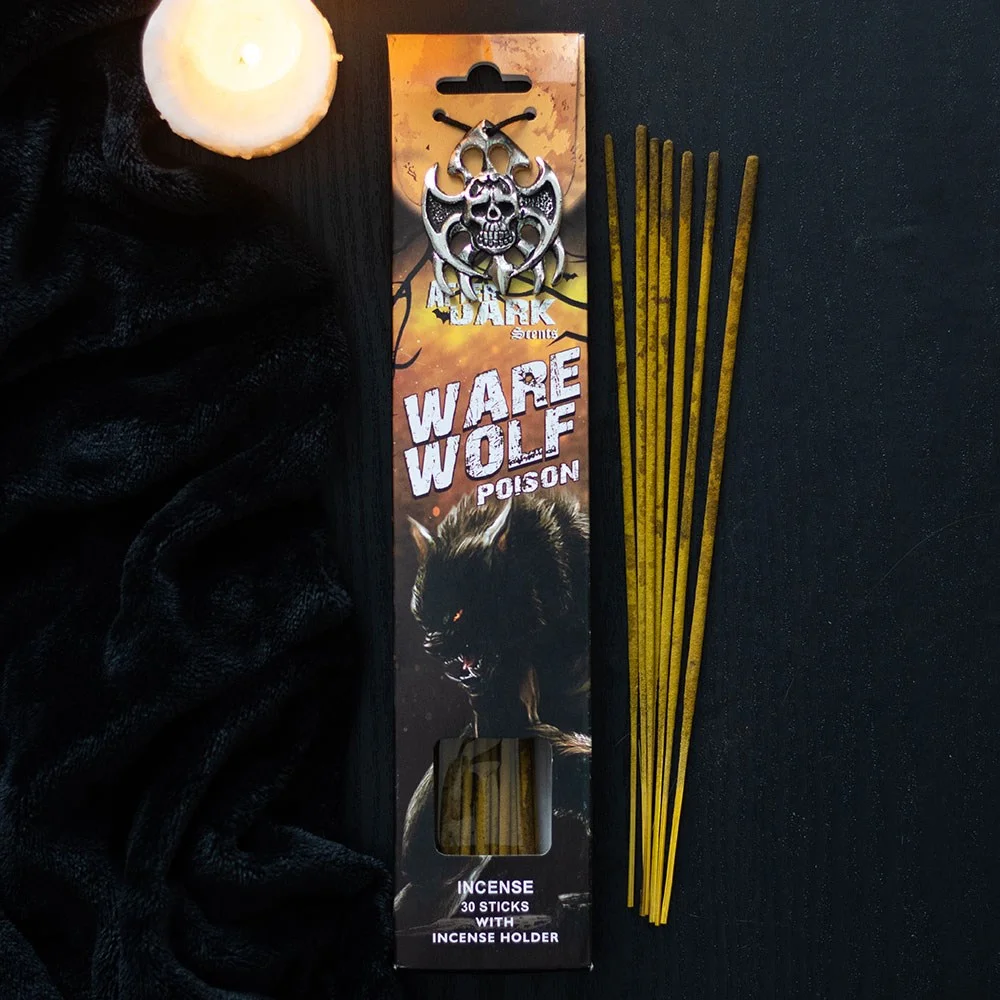 Werewolf incense sticks with vanilla scent arranged next to a metal holder from the After Dark collection
