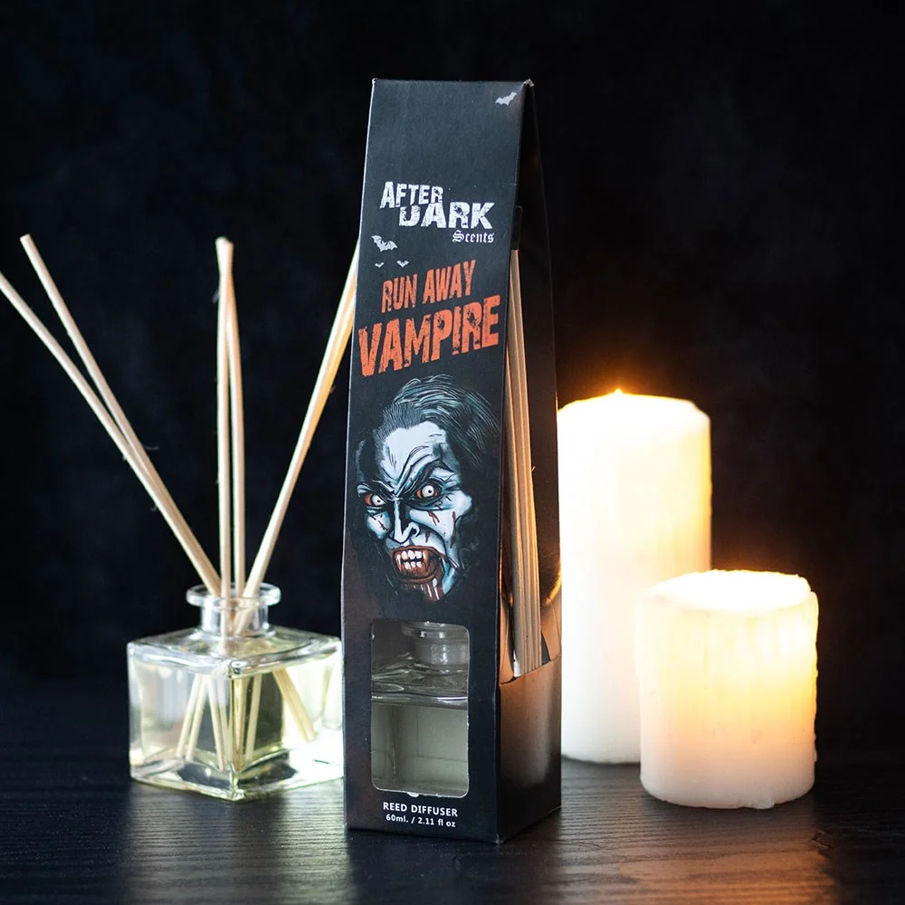 Run Away Vampire reed diffuser with black bottle, wooden reeds, and gothic-style label from After Dark collection