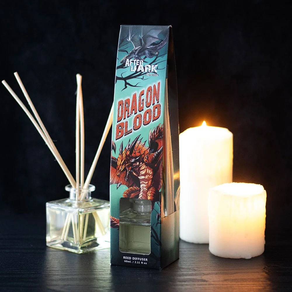 Dragon Blood reed diffuser with black reeds in a dark glass bottle, part of gothic After Dark home fragrance collection