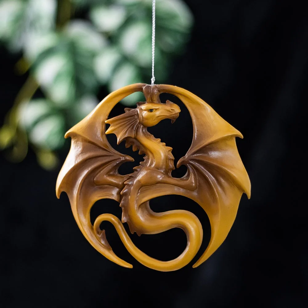 Yellow dragon emblem on round medal with hanging loop, dragon hanging ornament designed by Anne Stokes