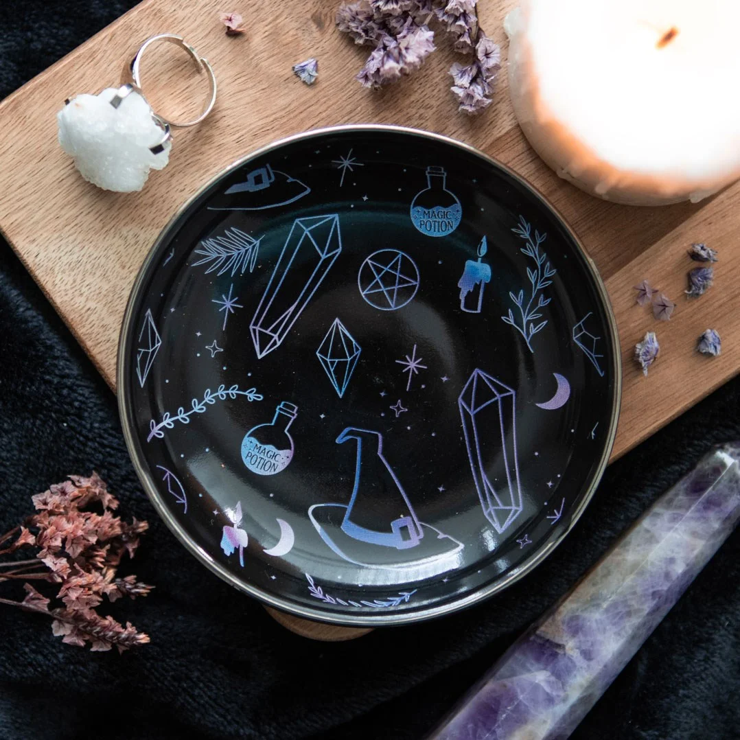 Black trinket dish with iridescent crystal witch illustration, ideal for storing jewellery and small items