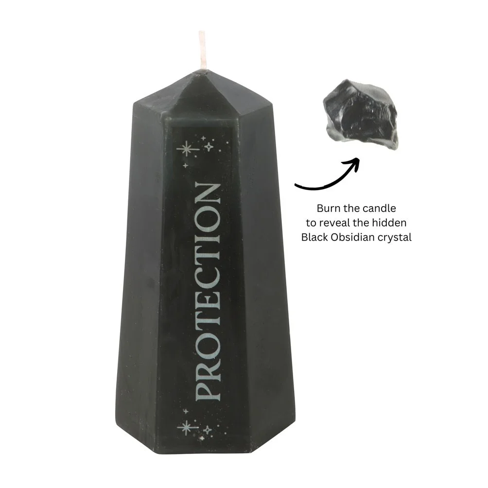 Black crystal tower protection crystal candle with rough black obsidian stone inside on a white background
