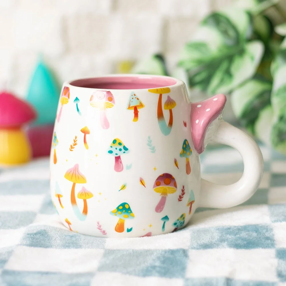 Ceramic funky mushroom mug with colorful fungi print and mushroom-shaped handle, 500ml capacity, hand wash only